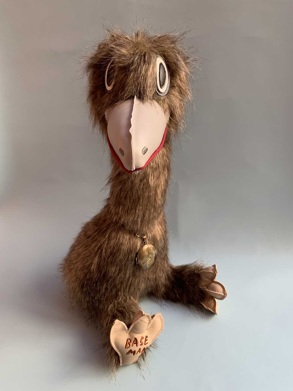 Manny Moa plush with locket